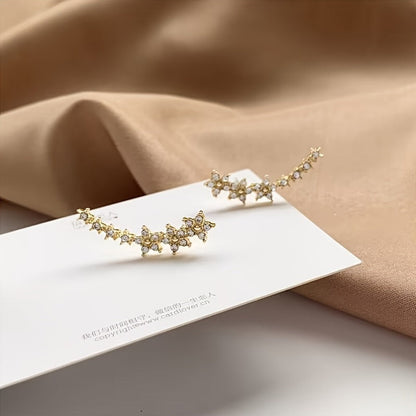 | BOUCLES D’OREILLES FLORALES INTEMPORELLES