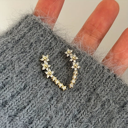 | BOUCLES D’OREILLES FLORALES INTEMPORELLES