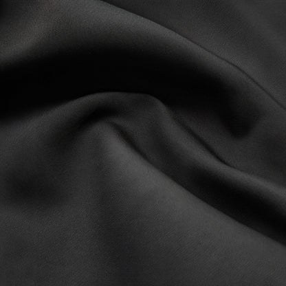 Nicoletta – Top Elegante con Detalle Nudo y Mangas Estructuradas