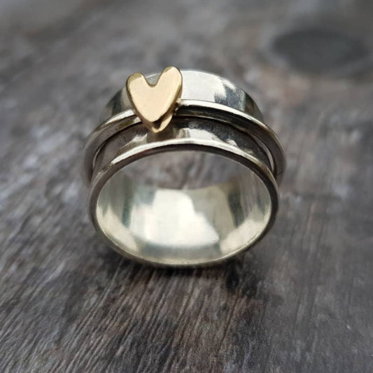ANILLO DE PLATA CON CORAZÓN DORADO