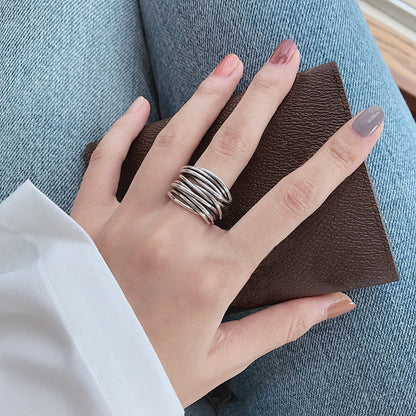 ANILLO AJUSTABLE DE PLATA EN CAPAS