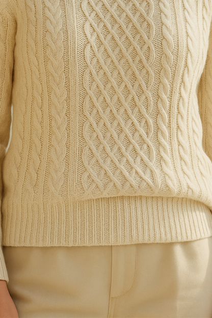 Jersey de punto suave con cuello vuelto y trenzado