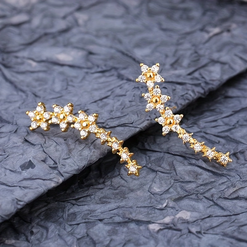 | BOUCLES D’OREILLES FLORALES INTEMPORELLES