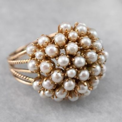 ANILLO CON PERLAS ENGARZADAS