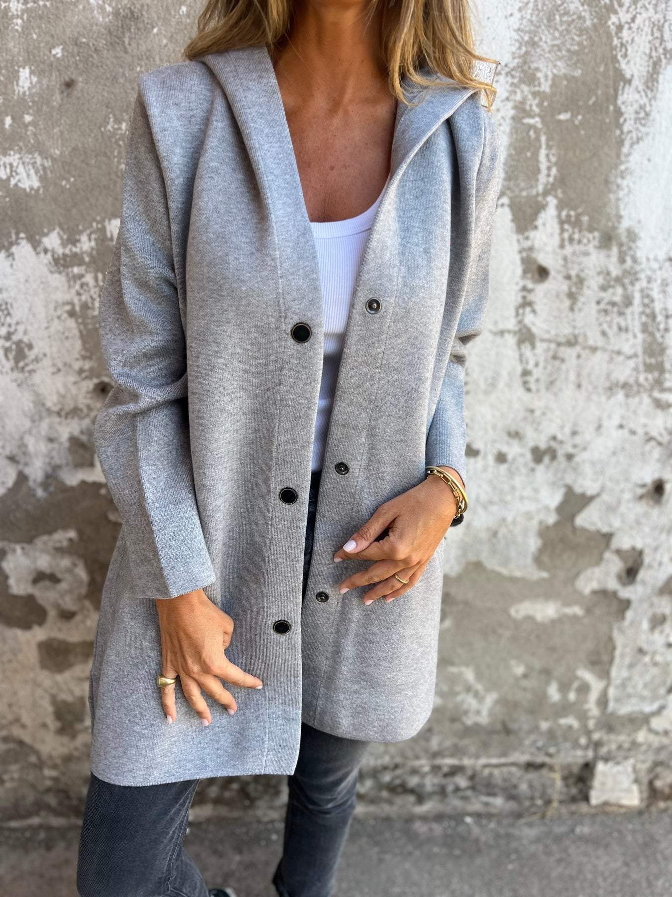 Chaqueta larga elegante con capucha
