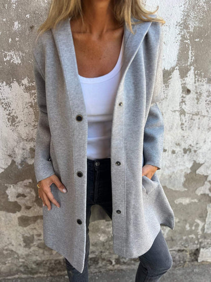 Chaqueta larga elegante con capucha
