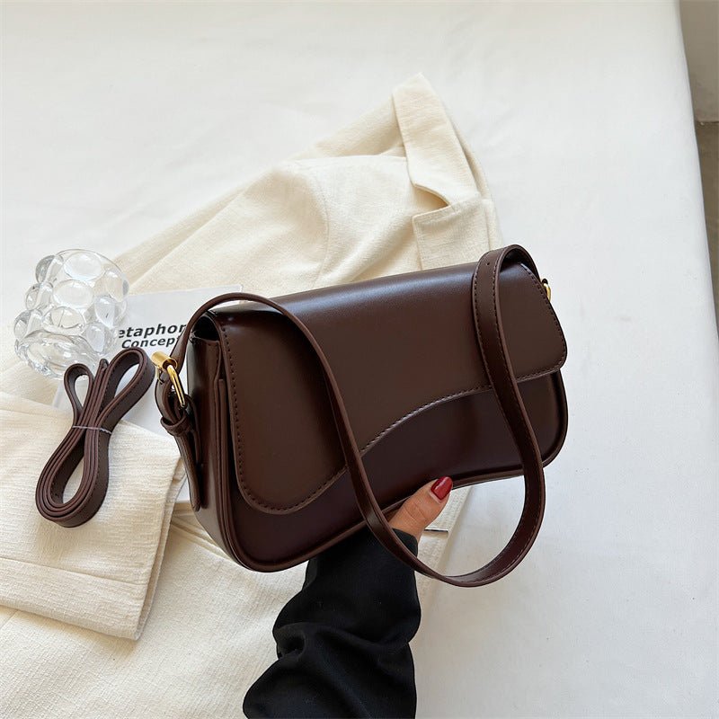 BOLSA DE SILLÍN ELEGANTE Y VERSÁTIL