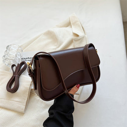 BOLSA DE SILLÍN ELEGANTE Y VERSÁTIL