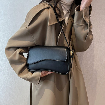 BOLSA DE SILLÍN ELEGANTE Y VERSÁTIL